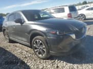 ✅ 2022 Mazda CX-5 S Premium • VIN: JM3KFBDM7N1631675 • Lot: 57424025. Listed on Copart with Not provided. Free auction sales archive from the USA and detailed vehicle history report at DreamBid. Image 4.