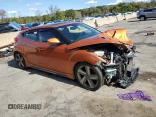 2015 Hyundai Veloster Turbo z VIN KMHTC6AE2FU232579, wystawiony jako Copart lot #70978033 z przebiegiem 105 790 mil mil oraz Szkoda całkowita • Salvage title. Historia ofert i sprzedaży dostępna na DreamBid. Obrazek 4.