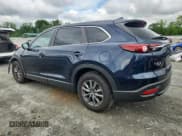 ✅ 2022 Mazda CX-9 Sport • VIN: JM3TCBBY9N0608178 • Лот: 63288935. Опубликован ранее на Copart с пробегом 70 505 миль. Бесплатный доступ к архиву аукционных продаж из США и подробный отчёт об истории автомобиля на DreamBid. Изображение 2.