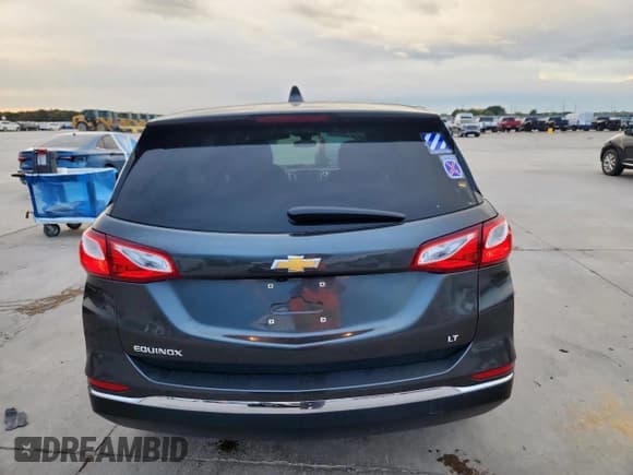 ✅ 2021 Chevrolet Equinox LT • VIN: 2GNAXUEV0M6146124 • Lot: 90476555. Listed on Copart with 64,975 mi. Free auction sales archive from the USA and detailed vehicle history report at DreamBid. Image 6.