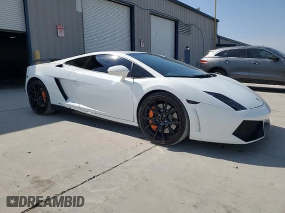 ✅ 2014 LAMBORGHINI GALLARDO GALLARDO • VIN: ZHWGU5BZ9ELA13938 • Лот: 80325615. Опубликован ранее на Copart с пробегом 35 258 миль. Бесплатный доступ к архиву аукционных продаж из США и подробный отчёт об истории автомобиля на DreamBid. Изображение 4.
