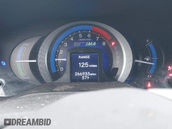 ✅ 2011 Honda Insight EX • VIN: JHMZE2H75BS006730 • Лот: 43685405. Опубликован ранее на IAAI с пробегом 266 933 миль. Бесплатный доступ к архиву аукционных продаж из США и подробный отчёт об истории автомобиля на DreamBid. Изображение 7.