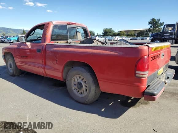 2000 Dodge Dakota z VIN 1B7FL26P7YS630499, wystawiony jako Copart lot #46513094 z przebiegiem Nie podano mil oraz Nie do naprawy • Non repairable. Historia ofert i sprzedaży dostępna na DreamBid. Obrazek 2.
