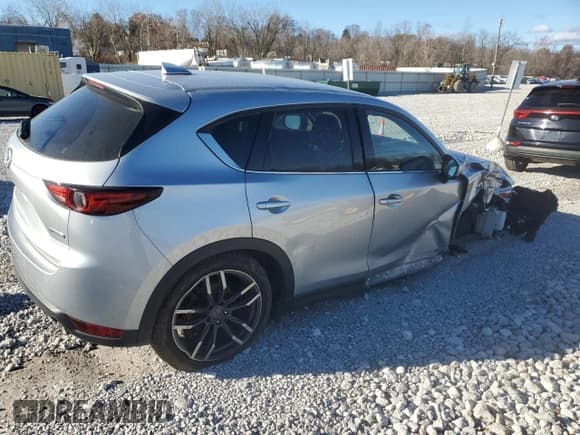 ✅ 2021 Mazda CX-5 Grand Touring • VIN: JM3KFADM4M0391130 • Lot: 93041755. Wystawiony na Copart z przebiegiem 91 710 mil. Bezpłatny archiwum sprzedaży aukcyjnych z USA i szczegółowy raport historii pojazdu na DreamBid. Zdjęcie 3.