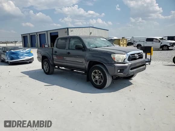 ✅ 2014 Toyota Tacoma PreRunner • VIN: 5TFJU4GN5EX054622 • Лот: 81393055. Опубликован ранее на Copart с пробегом 76 703 миль. Бесплатный доступ к архиву аукционных продаж из США и подробный отчёт об истории автомобиля на DreamBid. Изображение 13.
