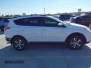 ✅ 2018 Toyota RAV4 XLE • VIN: JTMWFREV2JD132897 • Lot: 43310664. Listed on IAAI with 96,612 mi. Free auction sales archive from the USA and detailed vehicle history report at DreamBid. Image 14.