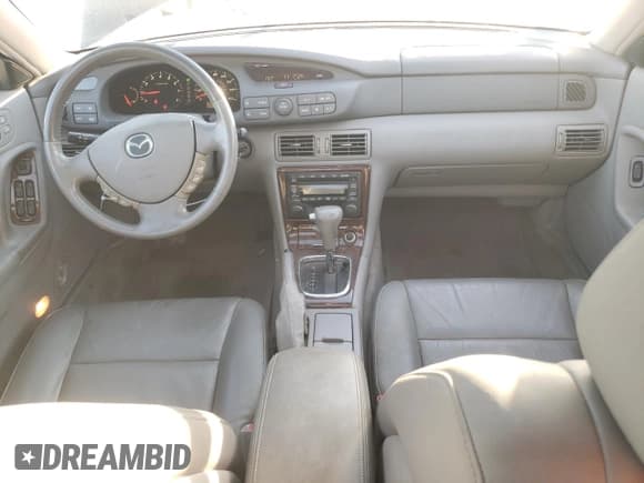 ✅ 2002 Mazda Millenia • VIN: JM1TA221021729625 • Лот: 87304234. Опубликован ранее на Copart с пробегом 88 376 миль. Бесплатный доступ к архиву аукционных продаж из США и подробный отчёт об истории автомобиля на DreamBid. Изображение 8.