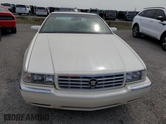✅ 1999 Cadillac Eldorado • VIN: 1G6EL12Y7XU615169 • Лот: 76459744. Опубликован ранее на Copart с пробегом Не указан. Бесплатный доступ к архиву аукционных продаж из США и подробный отчёт об истории автомобиля на DreamBid. Изображение 5.