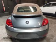 ✅ 2013 Volkswagen Beetle 2.5L • VIN: 3VW5P7AT1DM825757 • Lot: 41943380. Listed on IAAI with 46,967 mi. Free auction sales archive from the USA and detailed vehicle history report at DreamBid. Image 16.