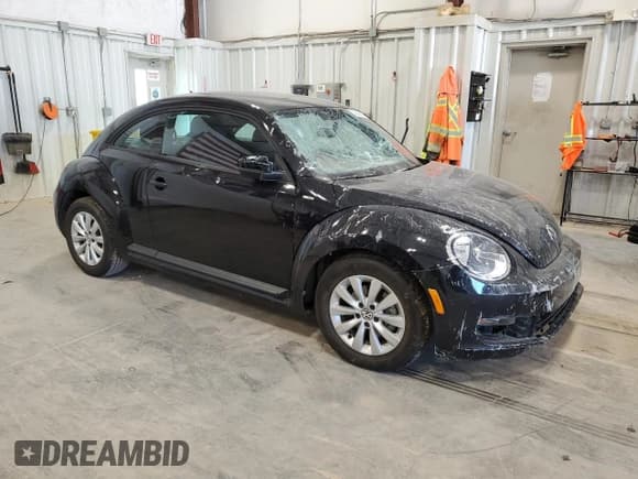 ✅ 2016 Volkswagen Beetle Classic • VIN: 3VWF17AT6GM611728 • Lot: 70389565. Listed on Copart with 35,022 mi. Free auction sales archive from the USA and detailed vehicle history report at DreamBid. Image 4.