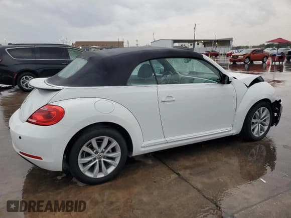 ✅ 2014 Volkswagen Beetle 2.0L TDI • VIN: 3VW5L7AT9EM823171 • Lot: 69486244. Listed on Copart with 65,557 mi. Free auction sales archive from the USA and detailed vehicle history report at DreamBid. Image 3.