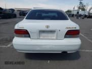 ✅ 1997 Toyota Avalon XL • VIN: 4T1BF12B8VU182635 • Лот: 69010194. Опубликован ранее на Copart с пробегом 224 893 миль. Бесплатный доступ к архиву аукционных продаж из США и подробный отчёт об истории автомобиля на DreamBid. Изображение 6.