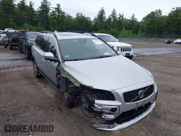 ✅ 2015 Volvo XC70 T6 • VIN: YV4902NKXF1231498 • Lot: 42547264. Listed on IAAI with 124,198 mi. Free auction sales archive from the USA and detailed vehicle history report at DreamBid. Image 1.
