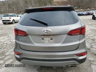 ✅ 2018 Hyundai Santa Fe 2.4L • VIN: 5NMZUDLB6JH090014 • Лот: 40852524. Опубликован ранее на Copart с пробегом Не указан. Бесплатный доступ к архиву аукционных продаж из США и подробный отчёт об истории автомобиля на DreamBid. Изображение 6.