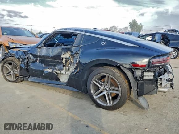 ✅ 2025 Nissan Z Sport • VIN: JN1BZ4AH7SM411341 • Лот: 95529625. Опубликован ранее на Copart с пробегом 4 109 миль. Бесплатный доступ к архиву аукционных продаж из США и подробный отчёт об истории автомобиля на DreamBid. Изображение 2.