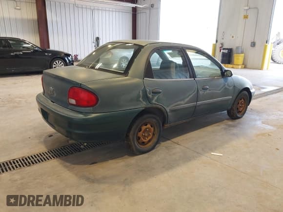 ✅ 1998 Chevrolet Metro Lsi • VIN: 2C1MR5225W6734147 • Лот: 43727340. Опубликован ранее на IAAI с пробегом 213 033 миль. Бесплатный доступ к архиву аукционных продаж из США и подробный отчёт об истории автомобиля на DreamBid. Изображение 4.