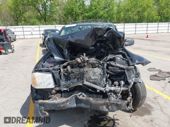 ✅ 2006 GMC Envoy SLE • VIN: 1GKDT13S562240769 • Lot: 42255973. Listed on IAAI with 183,423 mi. Free auction sales archive from the USA and detailed vehicle history report at DreamBid. Image 12.