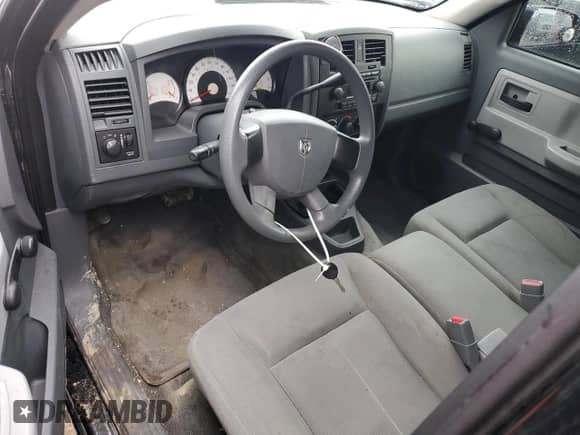 2006 Dodge Dakota ST с VIN 1D7HW22K06S714578, выставлен на аукционе Copart как лот 45666875 с пробегом 129 988 миль миль и Списание • Salvage title. История ставок и продаж доступна на DreamBid. Изображение 8.
