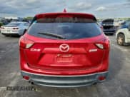 ✅ 2016 Mazda CX-5 Grand Touring • VIN: JM3KE2DYXG0772206 • Lot: 95505335. Listed on Copart with 106,791 mi. Free auction sales archive from the USA and detailed vehicle history report at DreamBid. Image 6.