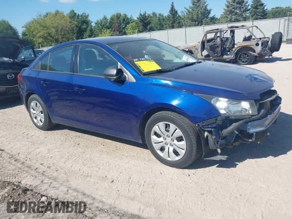 ✅ 2013 Chevrolet Cruze LS • VIN: 1G1PA5SH7D7185147 • Lot: 43296228. Listed on IAAI with 127,952 mi. Free auction sales archive from the USA and detailed vehicle history report at DreamBid. Image 1.