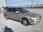 2002 Hyundai Elantra GLS z VIN KMHDN45D22U371819, wystawiony jako Copart lot #77000954 z przebiegiem 177 202 mil mil oraz Szkoda całkowita • Salvage title. Historia ofert i sprzedaży dostępna na DreamBid. Obrazek 4.