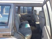 ✅ 1989 Jeep Cherokee • VIN: 1J4FJ38L6KL487868 • Lot: 43035472. Listed on IAAI with 216,947 mi. Free auction sales archive from the USA and detailed vehicle history report at DreamBid. Image 8.