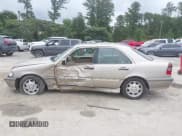 ✅ 1999 Mercedes-Benz C 230/260/280/320 • VIN: WDBHA29G2XA789962 • Lot: 42957917. Wystawiony na IAAI z przebiegiem 112 800 mil. Bezpłatny archiwum sprzedaży aukcyjnych z USA i szczegółowy raport historii pojazdu na DreamBid. Zdjęcie 14.