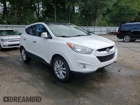 ✅ 2013 Hyundai Tucson GLS • VIN: KM8JUCACXDU609559 • Lot: 84447885. Listed on Copart with 213,627 mi. Free auction sales archive from the USA and detailed vehicle history report at DreamBid. Image 14.