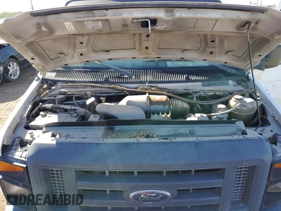 ✅ 2013 Ford Econoline Cargo Commercial • VIN: 1FTNE2EW3DDA05532 • Lot: 85399045. Listed on Copart with 149,626 mi. Free auction sales archive from the USA and detailed vehicle history report at DreamBid. Image 11.