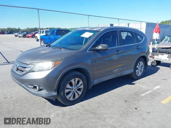 ✅ 2014 Honda CR-V EX-L • VIN: 2HKRM3H71EH541812 • Lot: 43513265. Listed on IAAI with 140,042 mi. Free auction sales archive from the USA and detailed vehicle history report at DreamBid. Image 2.