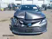 2022 Toyota Camry Hybrid XLE with VIN 4T1F31AK2NU597994, listed as a IAAI auction lot 42550485 with 71,900 mi miles and . Bid and sale history available at DreamBid. Image 12.