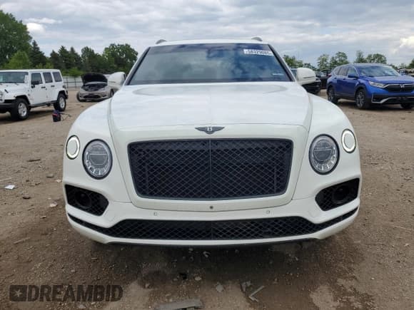 ✅ 2018 Bentley Bentayga Signature • VIN: SJAAC2ZV2JC017454 • Лот: 58329085. Опубликован ранее на Copart с пробегом 76 318 миль. Бесплатный доступ к архиву аукционных продаж из США и подробный отчёт об истории автомобиля на DreamBid. Изображение 5.