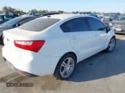 ✅ 2012 Kia Rio EX • VIN: KNADN4A35C6093602 • Lot: 41872556. Listed on IAAI with 123,526 mi. Free auction sales archive from the USA and detailed vehicle history report at DreamBid. Image 4.