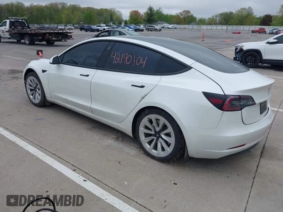 ✅ 2023 Tesla Model 3 • VIN: 5YJ3E1EA3PF563240 • Lot: 42190104. Listed on IAAI with 32,596 mi. Free auction sales archive from the USA and detailed vehicle history report at DreamBid. Image 3.