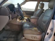 ✅ 1999 Toyota Land Cruiser • VIN: JT3HT05J0X0059222 • Лот: 77713294. Опубликован ранее на Copart с пробегом 406 869 миль. Бесплатный доступ к архиву аукционных продаж из США и подробный отчёт об истории автомобиля на DreamBid. Изображение 7.