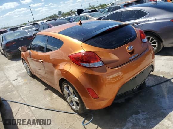 2015 Hyundai Veloster z VIN KMHTC6AD2FU229124, wystawiony jako Copart lot #51488653 z przebiegiem 62 406 mil mil oraz . Historia ofert i sprzedaży dostępna na DreamBid. Obrazek 2.