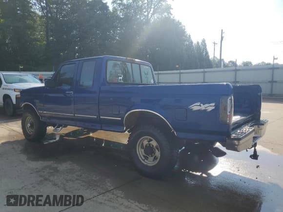 ✅ 1997 Ford F-250 • VIN: 1FTHX26G3VEC90100 • Lot: 67113245. Listed on Copart with 143,370 mi. Free auction sales archive from the USA and detailed vehicle history report at DreamBid. Image 2.