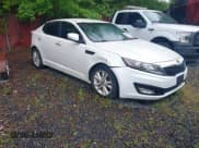 ✅ 2011 Kia Optima EX • VIN: KNAGN4A65B5143331 • Lot: 28176669. Listed on IAAI with 162,919 mi. Free auction sales archive from the USA and detailed vehicle history report at DreamBid. Image 1.