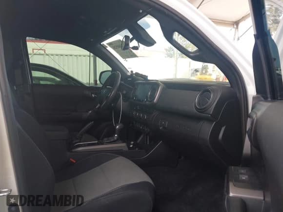 ✅ 2021 Toyota Tacoma SR • VIN: 3TMCZ5AN0MM387565 • Lot: 42300520. Listed on IAAI with 42,153 mi. Free auction sales archive from the USA and detailed vehicle history report at DreamBid. Image 5.