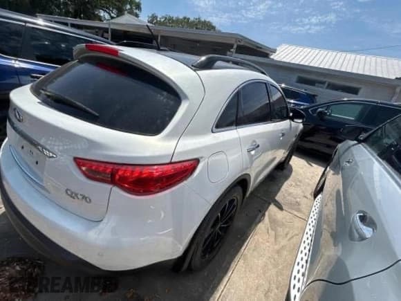✅ 2014 Infiniti QX70 • VIN: JN8CS1MW7EM410374 • Lot: 62132295. Listed on Copart with 79,644 mi. Free auction sales archive from the USA and detailed vehicle history report at DreamBid. Image 4.