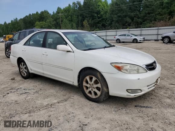 ✅ 2004 Toyota Camry LE • VIN: JTDBE32K440281087 • Лот: 60486995. Опубликован ранее на Copart с пробегом 229 856 миль. Бесплатный доступ к архиву аукционных продаж из США и подробный отчёт об истории автомобиля на DreamBid. Изображение 4.