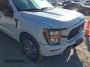 ✅ 2023 Ford F-150 XL • VIN: 1FTEW1EP2PFC12826 • Lot: 43471216. Wystawiony na IAAI z przebiegiem 34 437 mil. Bezpłatny archiwum sprzedaży aukcyjnych z USA i szczegółowy raport historii pojazdu na DreamBid. Zdjęcie 18.