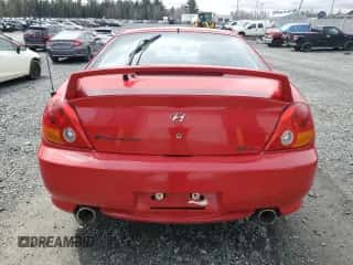 2004 Hyundai Tiburon GT z VIN KMHHN65F24U142204, wystawiony jako Copart lot #50347055 z przebiegiem 128 040 mil mil oraz Czysty tytuł • Clean title. Historia ofert i sprzedaży dostępna na DreamBid. Obrazek 6.