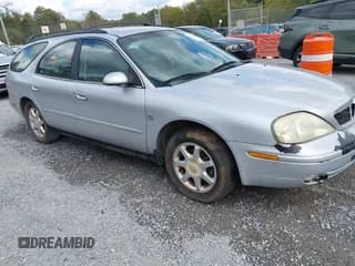 ✅ 2003 Mercury Sable LS Premium • VIN: 1MEHM59S73A613612 • Lot: 43284812. Listed on IAAI with 117,653 mi. Free auction sales archive from the USA and detailed vehicle history report at DreamBid. Image 1.