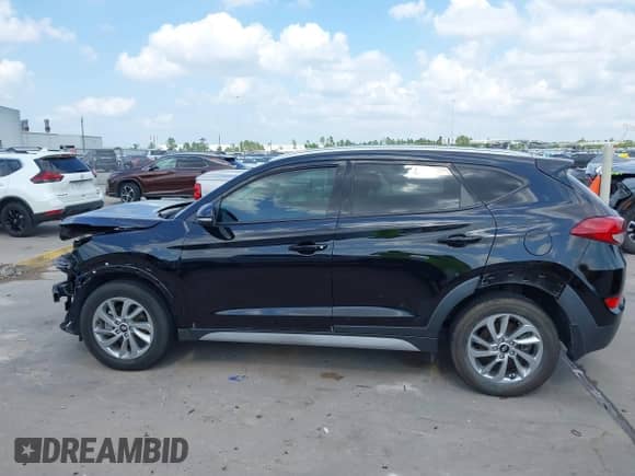 2018 Hyundai Tucson SEL z VIN KM8J33A42JU655670, wystawiony jako IAAI lot #42337024 z przebiegiem 56 730 mil mil oraz . Historia ofert i sprzedaży dostępna na DreamBid. Obrazek 15.