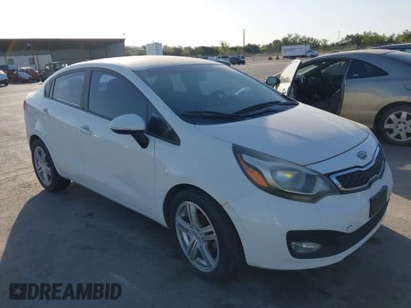 ✅ 2012 Kia Rio EX • VIN: KNADN4A35C6093602 • Lot: 41872556. Listed on IAAI with 123,526 mi. Free auction sales archive from the USA and detailed vehicle history report at DreamBid. Image 1.