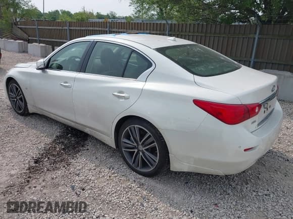 ✅ 2015 Infiniti Q50 Premium • VIN: JN1BV7AR2FM418418 • Lot: 42406682. Wystawiony na IAAI z przebiegiem 104 236 mil. Bezpłatny archiwum sprzedaży aukcyjnych z USA i szczegółowy raport historii pojazdu na DreamBid. Zdjęcie 3.