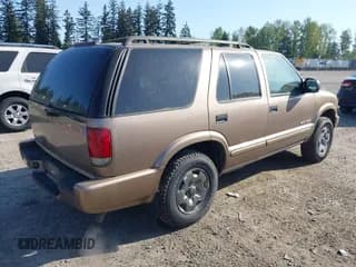 ✅ 2004 Chevrolet Blazer LS • VIN: 1GNDT13XX4K131557 • Lot: 42085978. Wystawiony na IAAI z przebiegiem 199 479 mil. Bezpłatny archiwum sprzedaży aukcyjnych z USA i szczegółowy raport historii pojazdu na DreamBid. Zdjęcie 4.