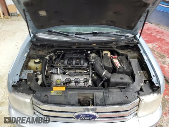 ✅ 2009 Ford Flex SEL • VIN: 2FMDK52C69BA14279 • Lot: 92406825. Listed on Copart with 192,979 mi. Free auction sales archive from the USA and detailed vehicle history report at DreamBid. Image 12.