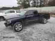 2006 Dodge Dakota SLT z VIN 1D7HE42N16S702822, wystawiony jako Copart lot #44034175 z przebiegiem 141 509 mil mil oraz Szkoda całkowita • Salvage title. Historia ofert i sprzedaży dostępna na DreamBid. Obrazek 1.